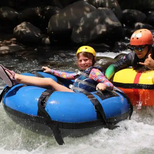 join a la leona waterfall and tubing tour with kids